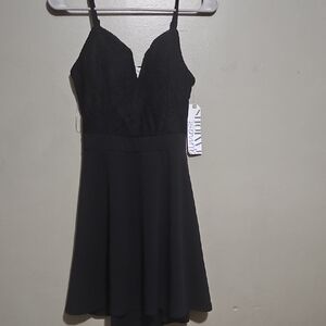 Almost Famous Black Plunge Neck Mini Dress